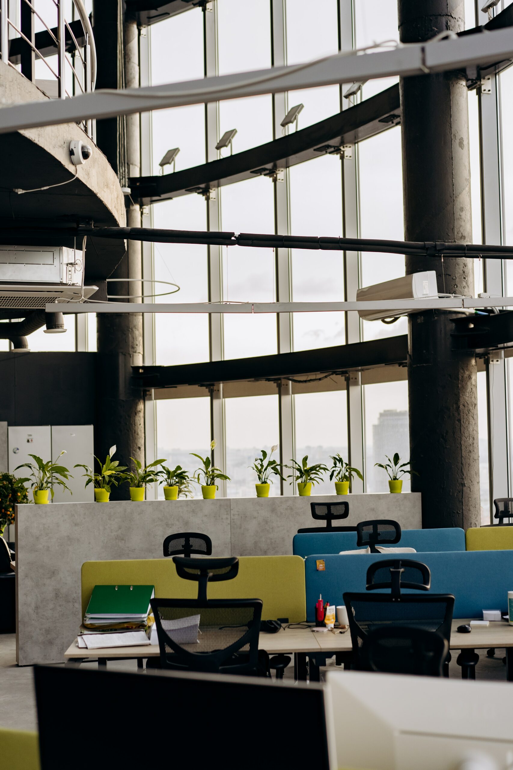 pexels-mikhail-nilov-8297853 Open office space with plants